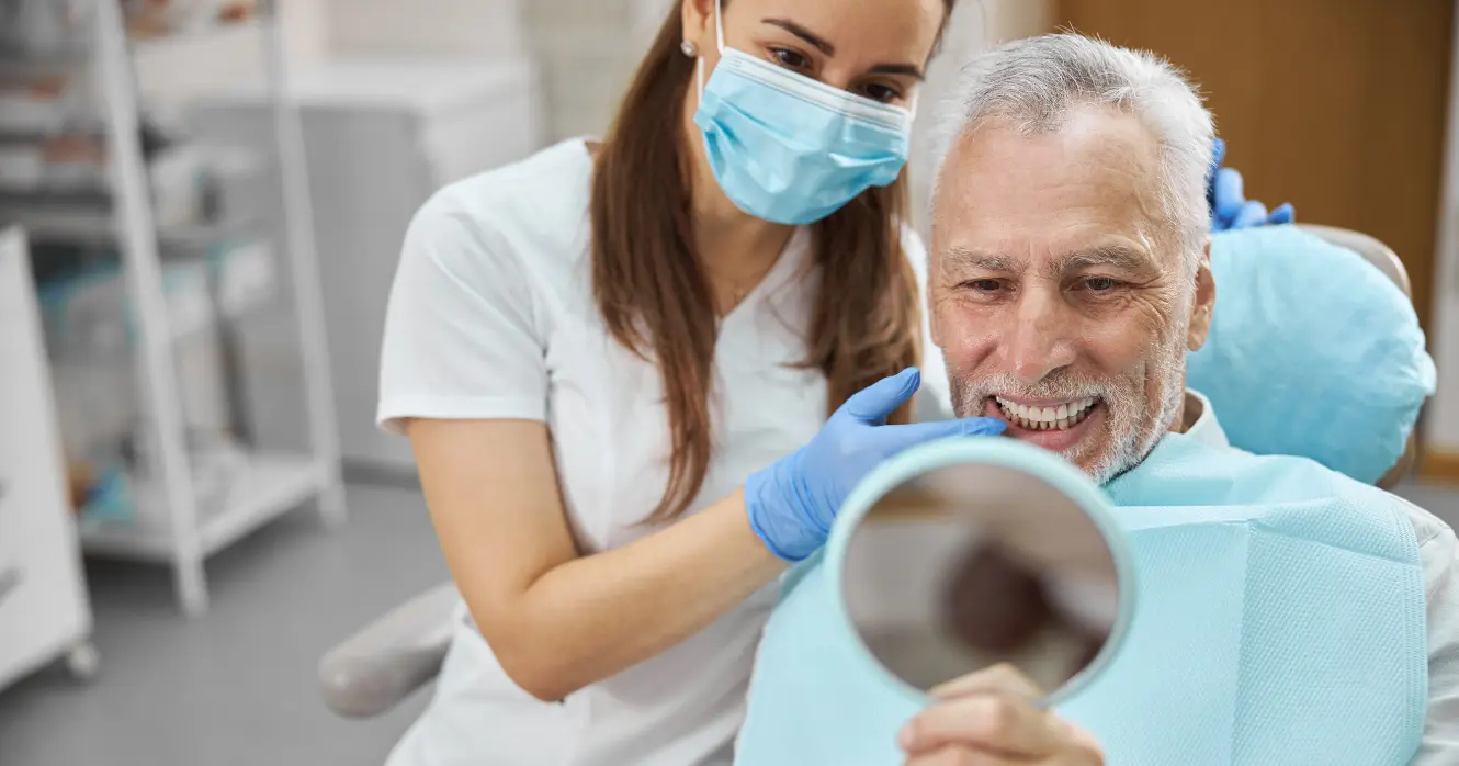 Patient Smiling After Dental Emergency Treatment