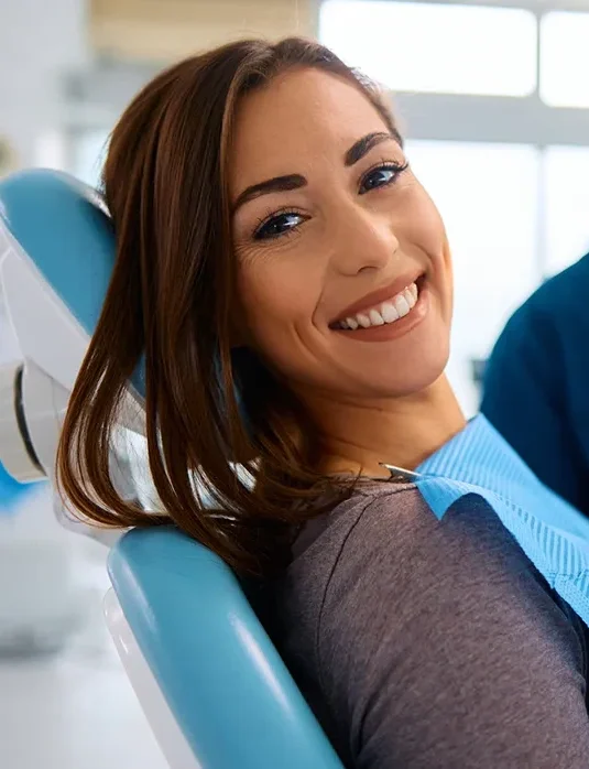 patient smiling feeling good at the dentist